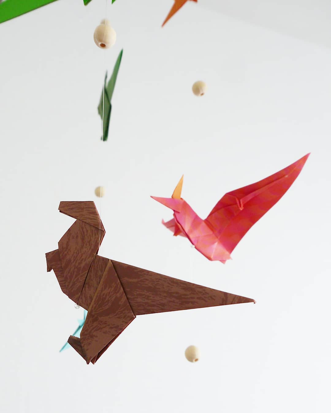Origami baby mobile - Little dinosaurs